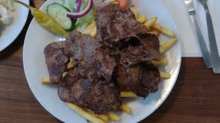 Lunch at a nearby pizzeria quot Oxfile tallrikquot French fries and Beef With beer and salad [upl. by Raine457]