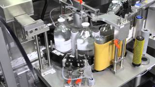 HERMA 132M HC  Wraparound labelling machine for glass bottles [upl. by Bellamy844]