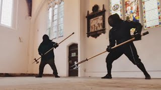 HEMA poleaxe free sparring in a medieval building [upl. by Ardnasil]