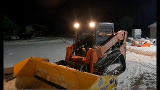 Snow plowing with Kubota skid steer [upl. by Aihpledalihp]