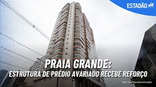 Estrutura de prédio avariado na Praia Grande recebe reforço veja [upl. by Dougald988]