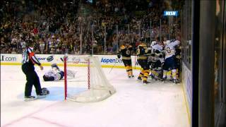 Milan Lucic drills Ryan Miller 111211 [upl. by Llerred]