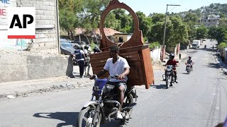 Gang coalition in Haiti spreads violence to PortauPrince neighborhood [upl. by Mercola450]