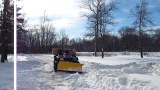 2002 Arctic Cat 300 4x4 plowing foot of snow [upl. by Bindman]