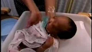 How to Give your Baby a Swaddle Bath [upl. by Apilef]