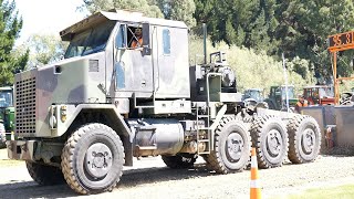 ExUS Military Oshkosh M1070 Truck Pulling a DeutzFahr 8280 TTV Tractor in Waimumu [upl. by Bradeord821]