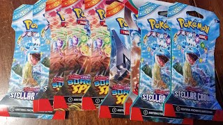 Ripping 9 packs of Pokemon including some Surging Sparks [upl. by Anrehs]