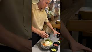 Bibimbap mixing foodandtravel foodie koreanfood korean [upl. by Nogas635]