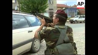 YUGOSLAVIA KOSOVO KFOR TROOPS PROTECT SERB FAMILY [upl. by Ydnerb]