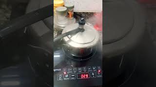 Pressure cooker whistle sound on Induction cooktop [upl. by Sudnak]