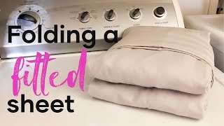 Folding A Fitted Sheet  How To Fold Sheets [upl. by Nauqan472]