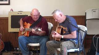 Tommy Emmanuel CGP and Paul Moseley jamming on quotSittin On Top of the Worldquot [upl. by Inafit]