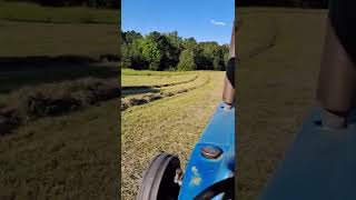 Fall hay day Raking with the Ford 6610 tractor Making round bales [upl. by Artim193]