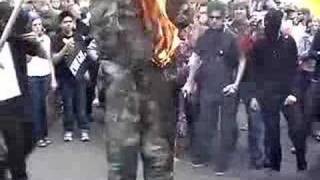 AntiWar Protesters Burning US Soldier in Effigy [upl. by Myriam]