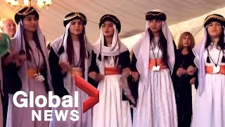 Yazidi womens choir that fled Iraq performs in UK [upl. by Enylodnewg]