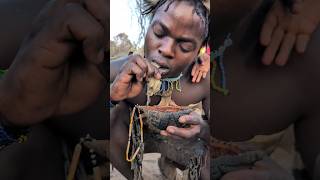 Its breakfast time See how Hadza boy enjoying his favorite breakfast food hadzabetribe africa [upl. by Adalbert]