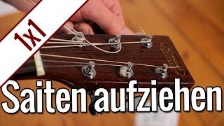 Gitarrensaiten aufziehen  Gitarren 1x1 [upl. by Erhard]