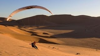 Paragliding Over a Sea of Sand Dunes in Namibia [upl. by Laurene]