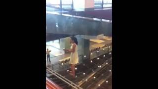 Woman damages Kinetic Rain sculpture at Changi airport [upl. by Pellegrini164]