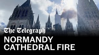 Famous French cathedral catches fire in Rouen [upl. by Ennovahc618]