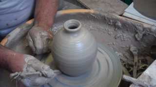 pottery throwing a narrow necked bottle [upl. by Asher]