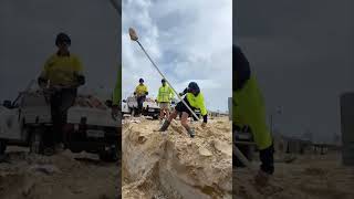 Guy Using a Custom Long Shovel to Dig a Trench Easily [upl. by Ynalem480]