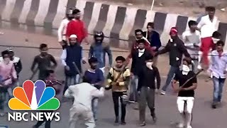 Violence Erupts On The Streets Of New Delhi Over Controversial Citizenship Law  NBC News [upl. by Rebna]