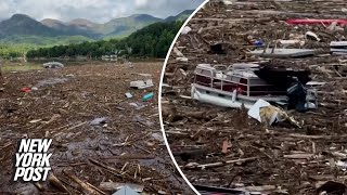 Debris clogs North Carolina lake caused by Hurricane Helene [upl. by Griffith627]