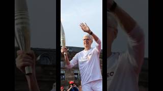 Arsène Wenger with the Olympic Torch to light up the cauldron at Strasbourg [upl. by Iznyl]