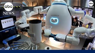 Robot barista serves coffee at CES [upl. by Adneram]