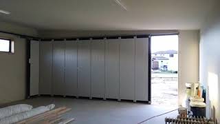 Automatic Sectional Side sliding garage door [upl. by Novaelc]