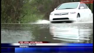 Firefighters pull people to safety after cars left stranded on flooded roads [upl. by Lottie522]