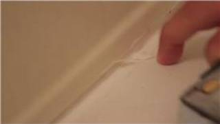 Construction Work  How to Caulk a Tub Surround [upl. by Ninel]