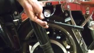 Motorcycle Repair Adjusting the Rear Suspension Air System Shocks on a Harley Davidson [upl. by Accem]