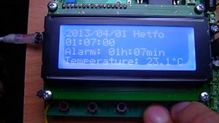 DIGITAL CLOCK PIC16f877 RTC DS1307 LCD 4x20 DS18b20 temperature [upl. by Assirim]