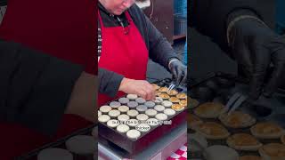 MustTry Dutch Food Poffertjes mini pancakes at the Albert Cuyp Market in Amsterdam [upl. by Donough]