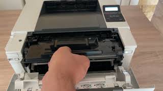 Cum inlocuiesc cartusul HP LaserJet M404dn M404dw M404n M304a M406dn CF259A 59A CF259X 59X [upl. by Nomyt]