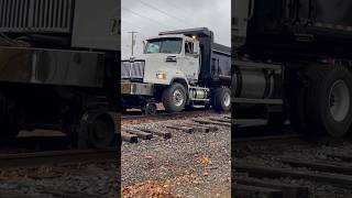 SPS high rail dump truck leaving the job site on the CN main line canadianrail roadrail [upl. by Lipinski]