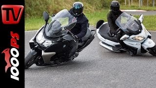 Suzuki Burgman 650 vs BMW C 650 GT  Scooter Battle [upl. by Arihsak845]