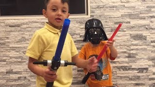 Lord and Joe Unboxing Star Wars Jedi Lightsabers [upl. by Shah]