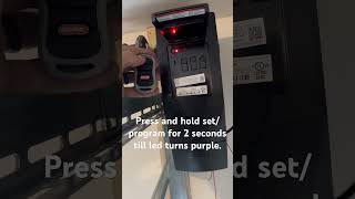 How to program Genie Remote to opener howto garagedooropener genie garagedooropenerrepair [upl. by Ecinereb]