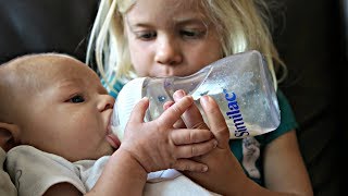 BREASTFEEDING BABY DRINKS FROM A BOTTLE [upl. by Mcnally]