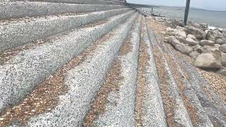 Waveeroded beachside concrete steps [upl. by Nhtanhoj]