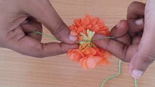 Flower garland making tutorialTraditional method to make garlandHow to tie kanakambaram garland [upl. by Assenad500]