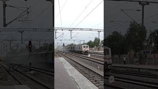 Dust Storm by BGKT WAP7 honks in High Speed 18573 Vishakhapatnam  Bhagat Ki Kothi Express [upl. by Ecinaj]