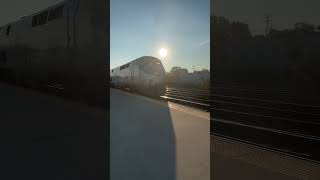 Amtrak comes flying around the corner as it enters Elkhart’s station [upl. by Anaitat676]