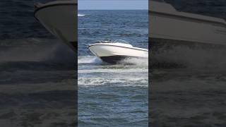 Boat Whaler Chases A Center Console Through The Manasquan Inlet [upl. by Nylkcaj]