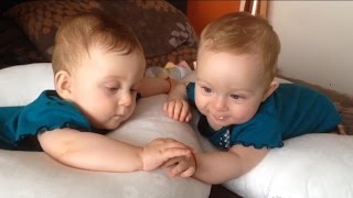 Identical twin babies talk and hold hands Part 2 while one rolls over for the first time [upl. by Adnohser37]