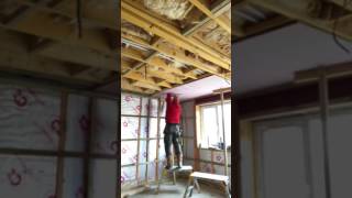 How to plasterboard a ceiling on your own [upl. by Moreland]