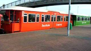 Langeoog Inselbahn vom Hafen Abfahrt in den Ort [upl. by Ihdin371]